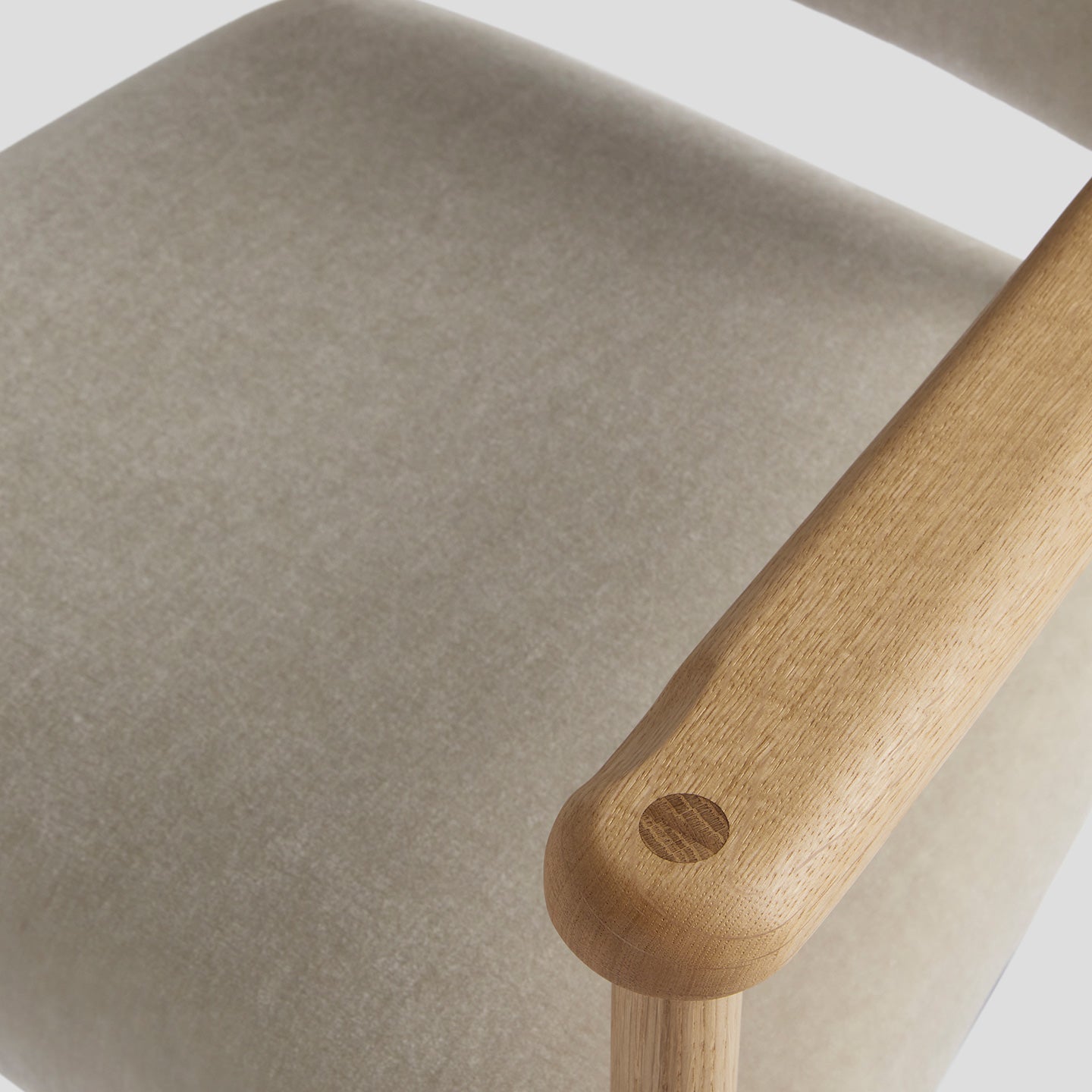 The Kudu Carver Dining Chair in Natural Oak